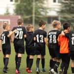 group of young football players are reunited. brain injury.